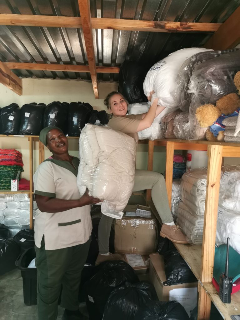 Marietjie and Dolphine in store room