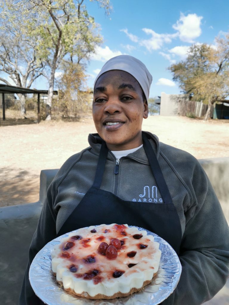 Virginia shows off her strawberry cheesecake at Garonga Safari Camp